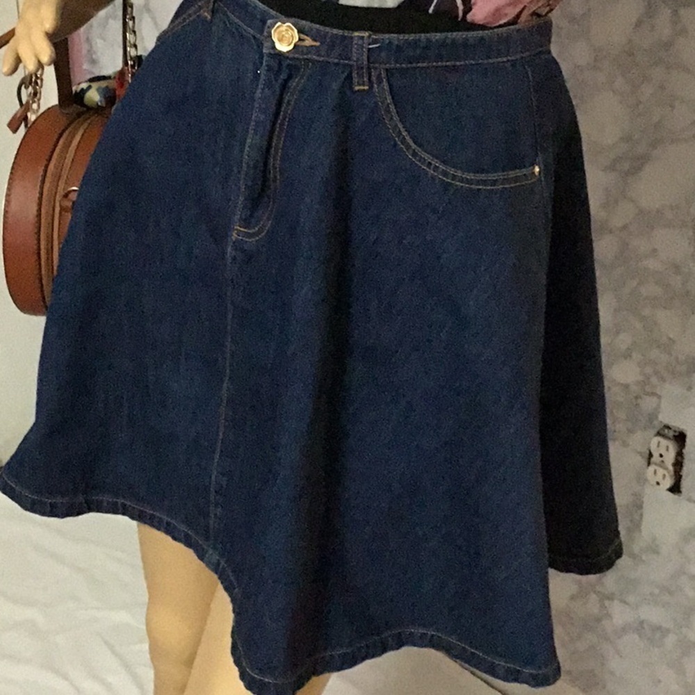 Junior size medium Denim skater skirt with pockets.